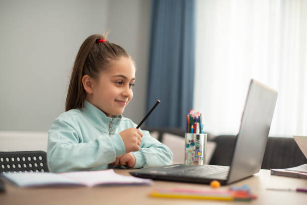 A child engaged in online Spanish learning, expanding linguistic horizons with MasterMindz