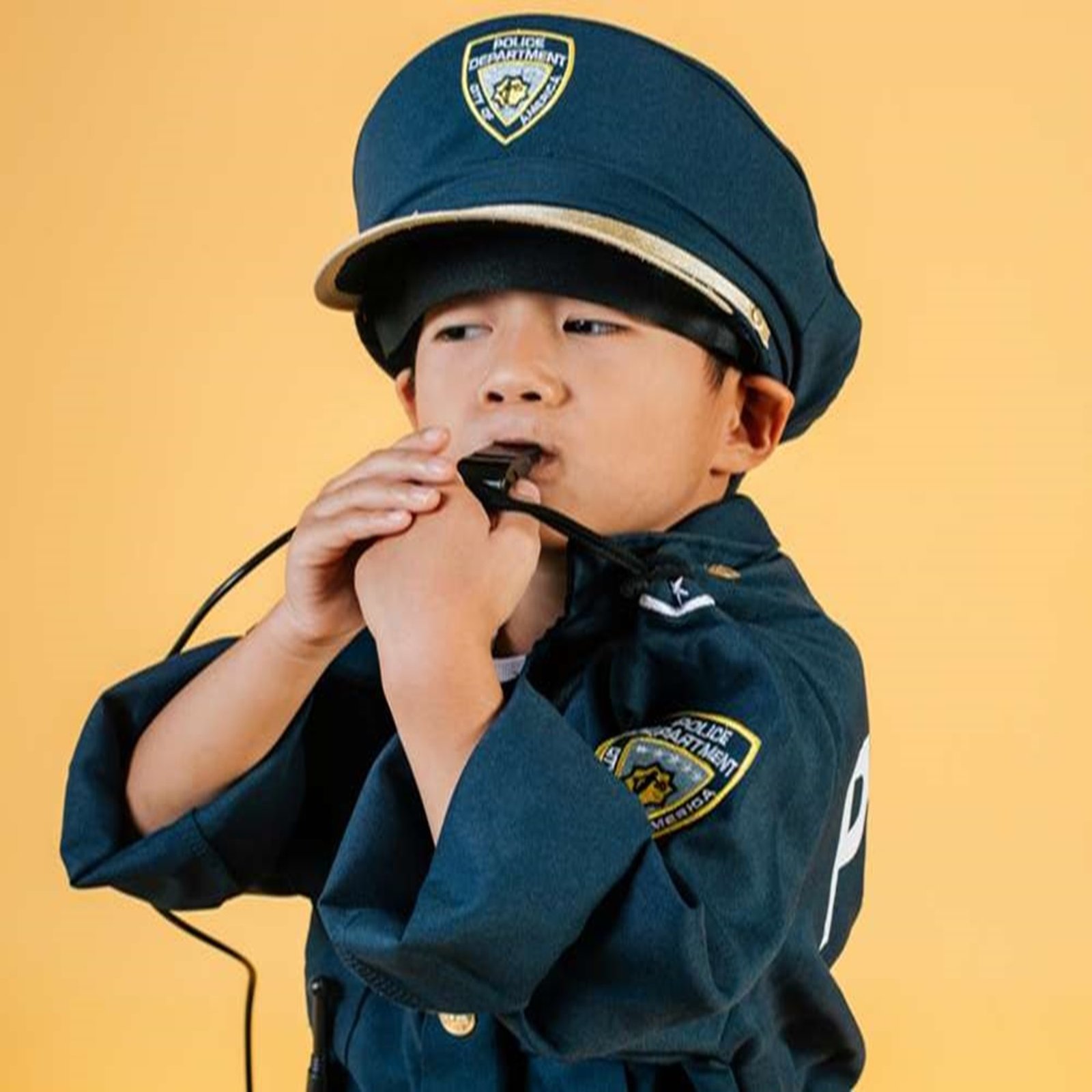 Child safely attending a supervised online class at home with a parent nearby