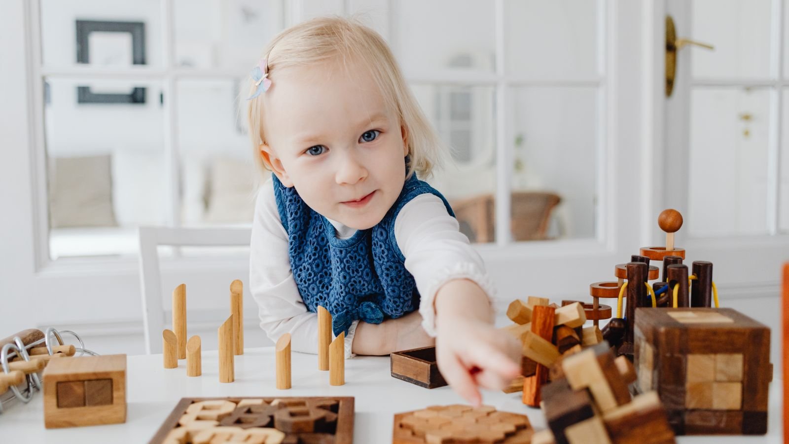 Child aged around eight concentrating on a puzzle at home during a daily ten minute brain game