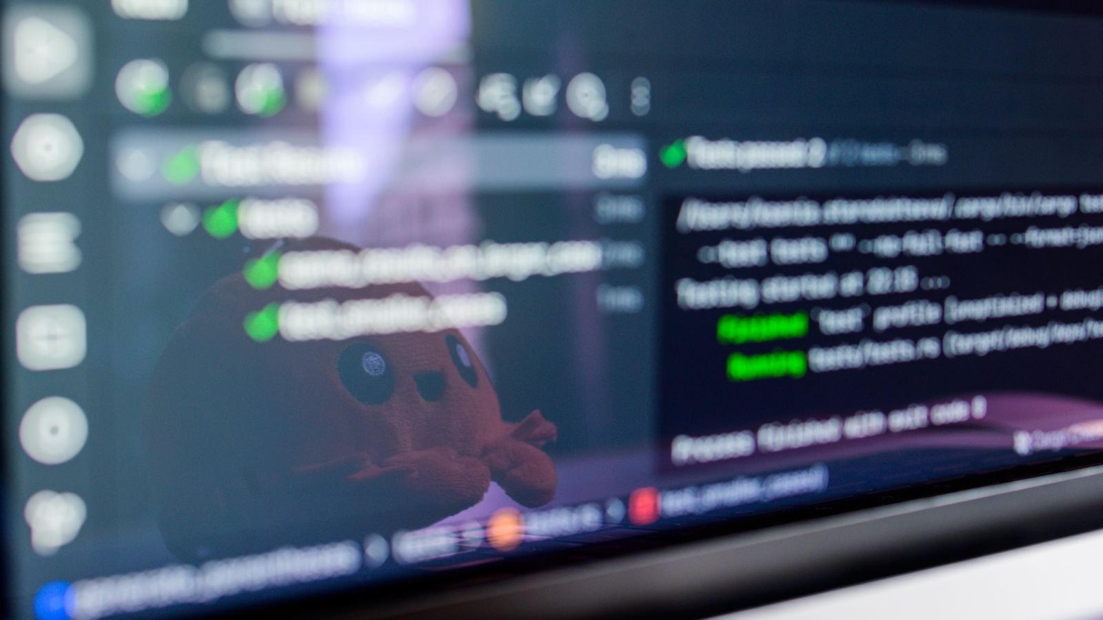 Child coding on a laptop with a colourful drag and drop coding screen