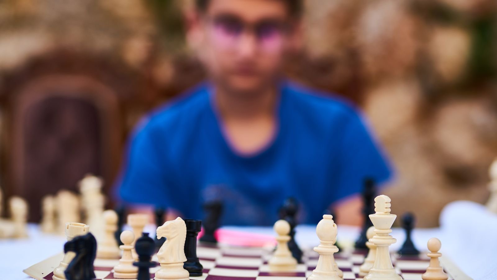 Beginner child reviewing a chess game online to improve their chess rating